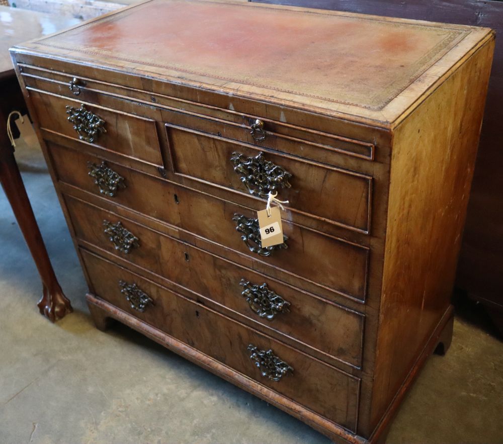 A George I walnut chest, with brushing slide, two short and three graduated long drawers, width 82cm